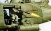 Firing doorgunner in close up