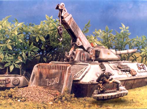 Dozer blade in use with infantry in support